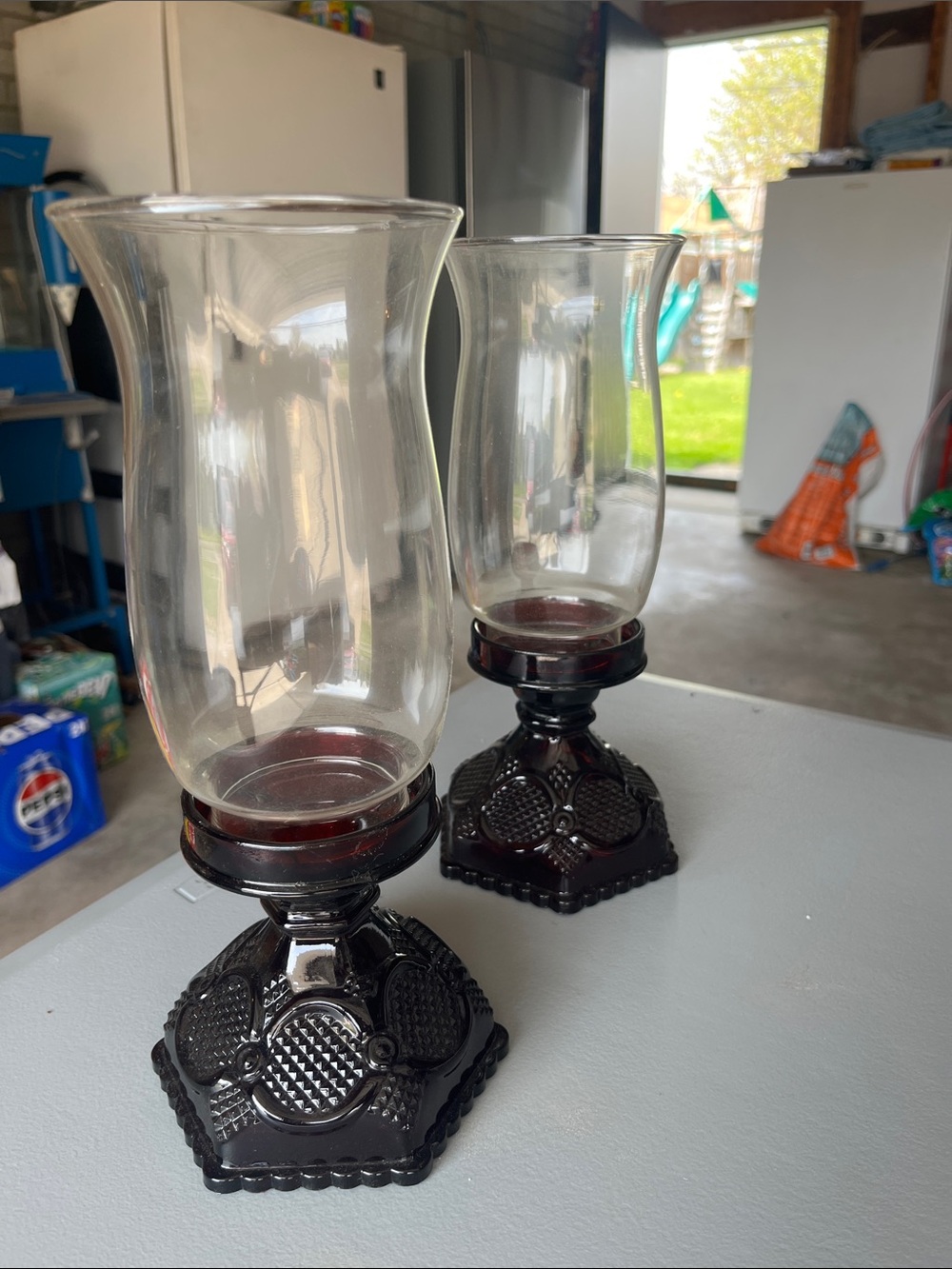 Avon Clear Glass Hurricane Candle Holders with Cranberry Pedestals - Pair or sep